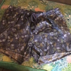 Blue shorts with pineapple print